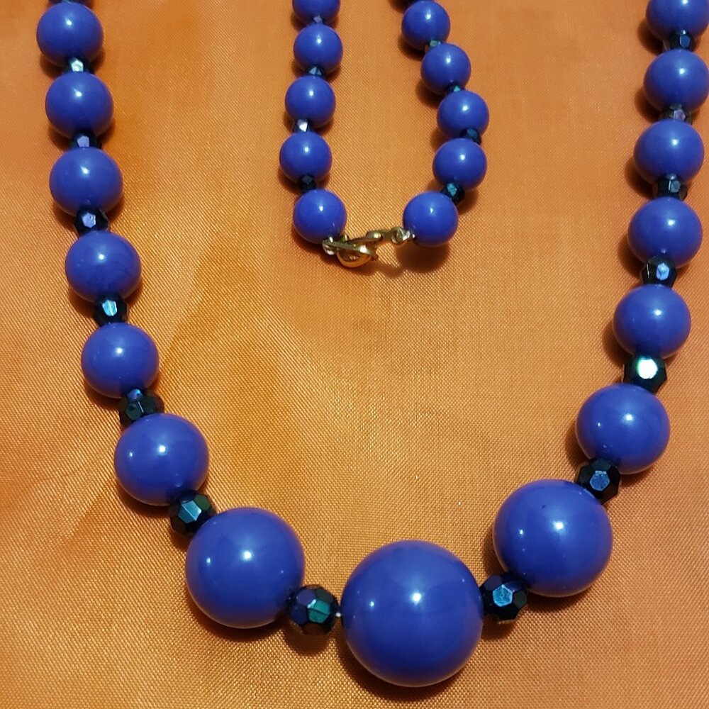 Purple Necklace With Multi Color Fauceted Black Beads.